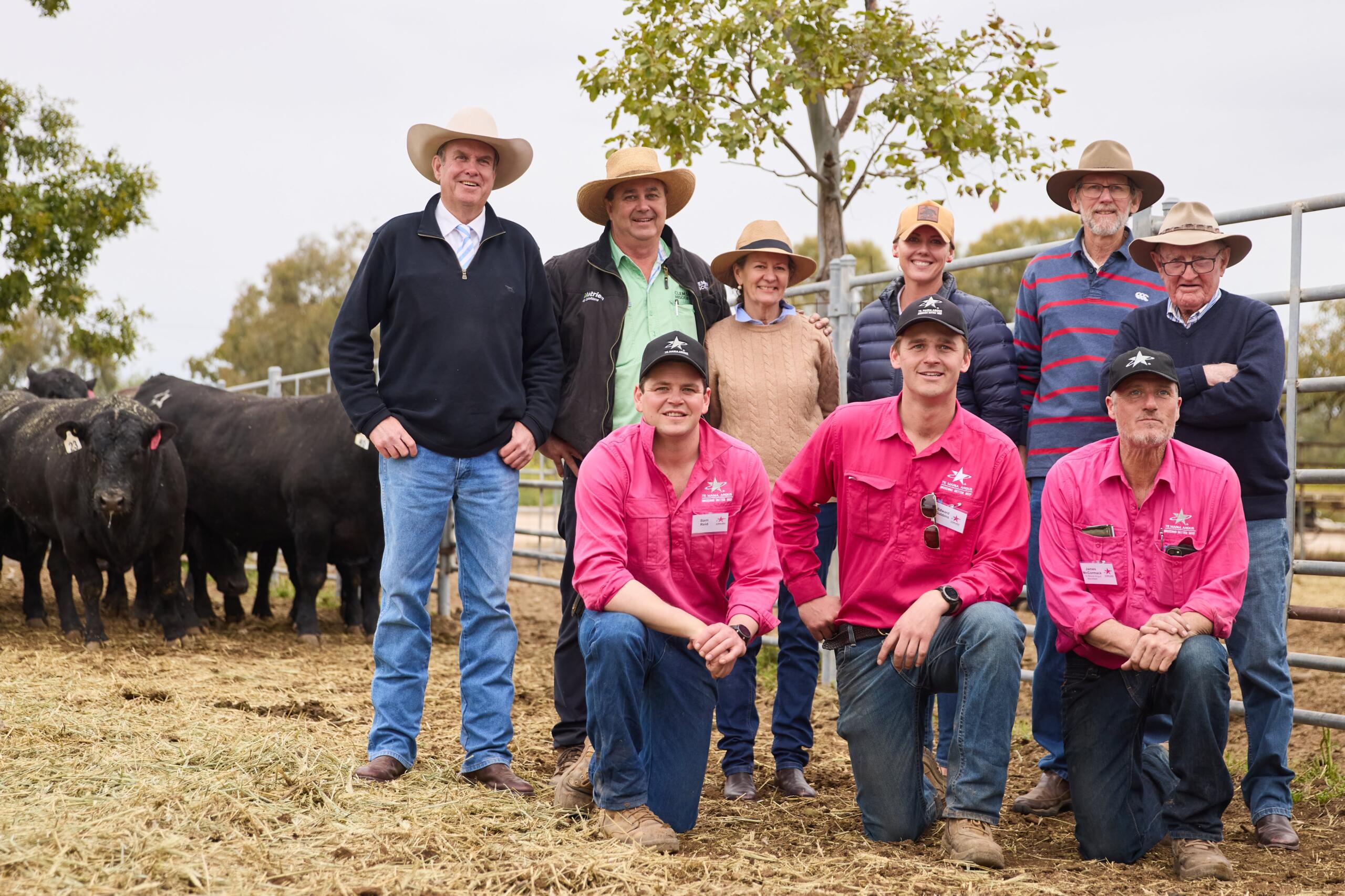 Auctioneer Paul Dooley, Tamworth, Russell Hiscox, Walgett, volume buyers Annie O'Brien, Come By Chance, Jessica Morton and Leon Price, Roma, Qld, Michael O'Brien, Come By Chance, and (front) Te Mania's Sam Reid, Edward Gubbins, and James McCormack. Picture by Rebecca Nadge